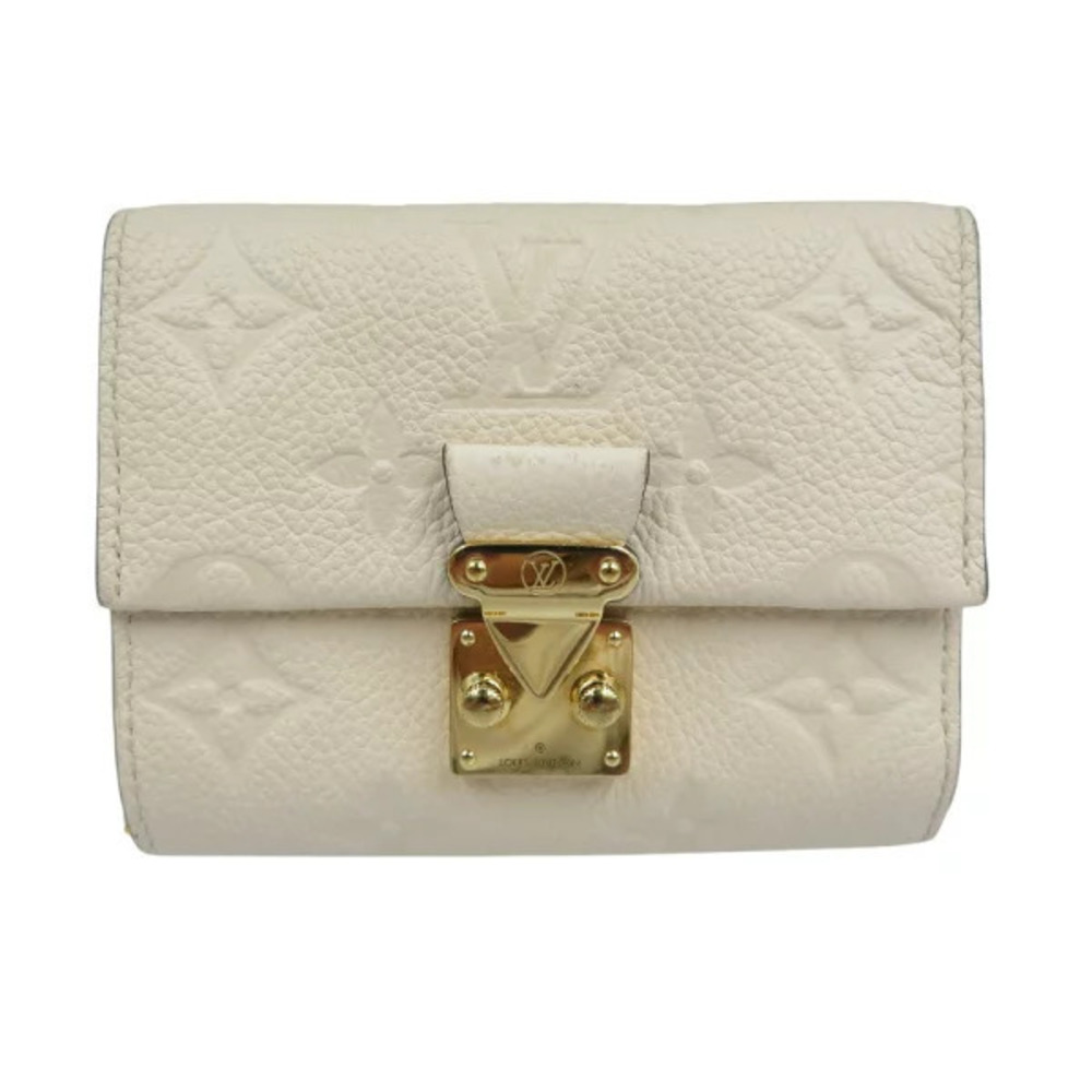 Louis Vuitton Monogram Empreinte Portefeuille Metis cream trifold wallet